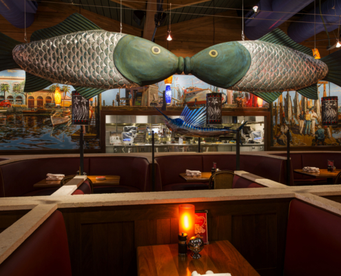 Coastal Flats Fish Sculpture above booth dining room Forrester Construction