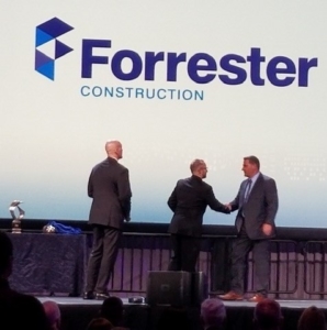 Forrester Construction Accepting Award - Tips on Promoting Construction Projects and your company