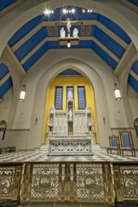 Corpus christi catholic church interior blue vaulted ceilings with church pews Forrester Construction