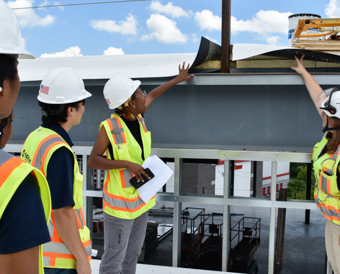 Forrester Construction intern and project manager giving site tour